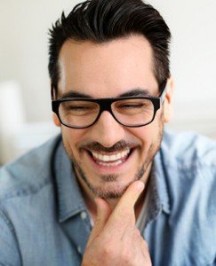Funny mature man with a beautiful smile from gum rejuvenation treatment