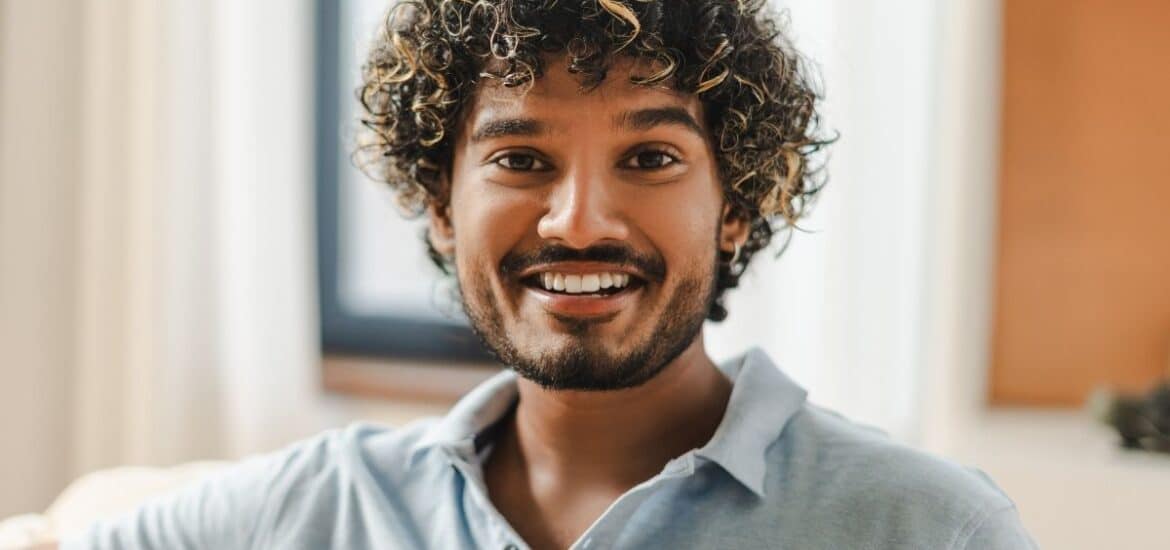 person with a healthy smile showing importance of dental care